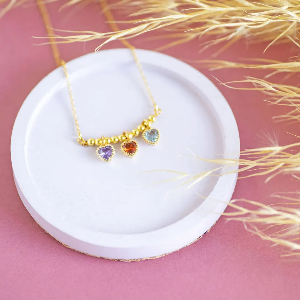 Joy by Corrine Smith Beaded Triple Heart Halskette Gold