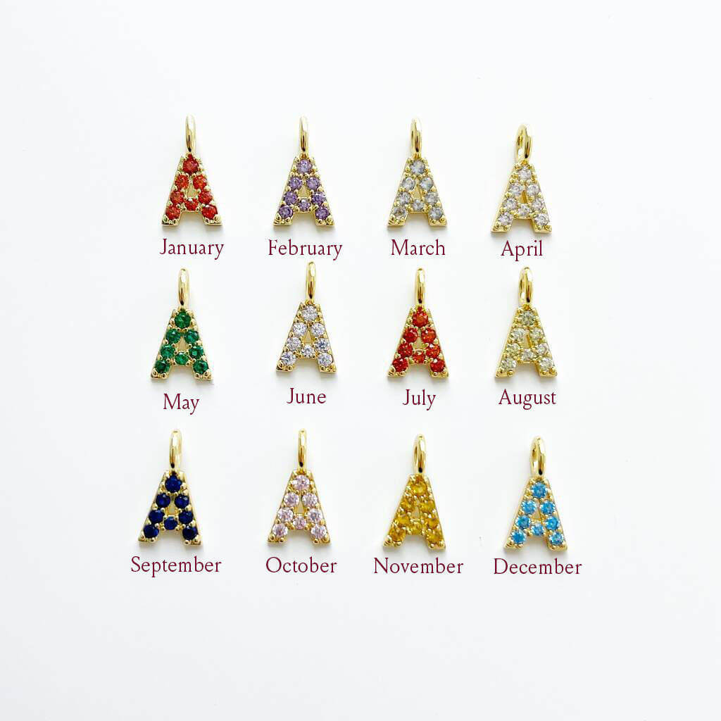 Joy by Corrine Smith Initial Armreif Geburtsstein Gold verstellbar