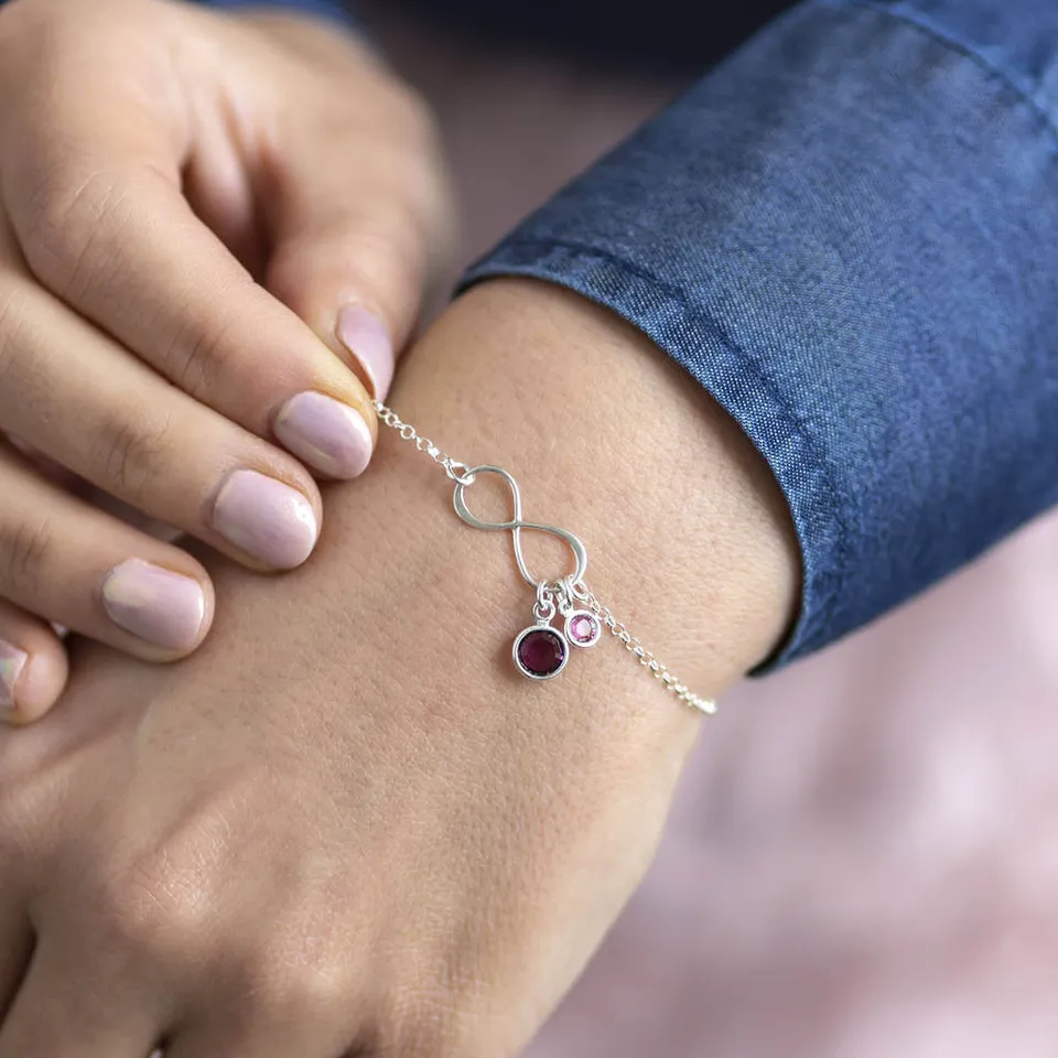 Joy by Corrine Smith Infinity Geburtsstein Armband Silber