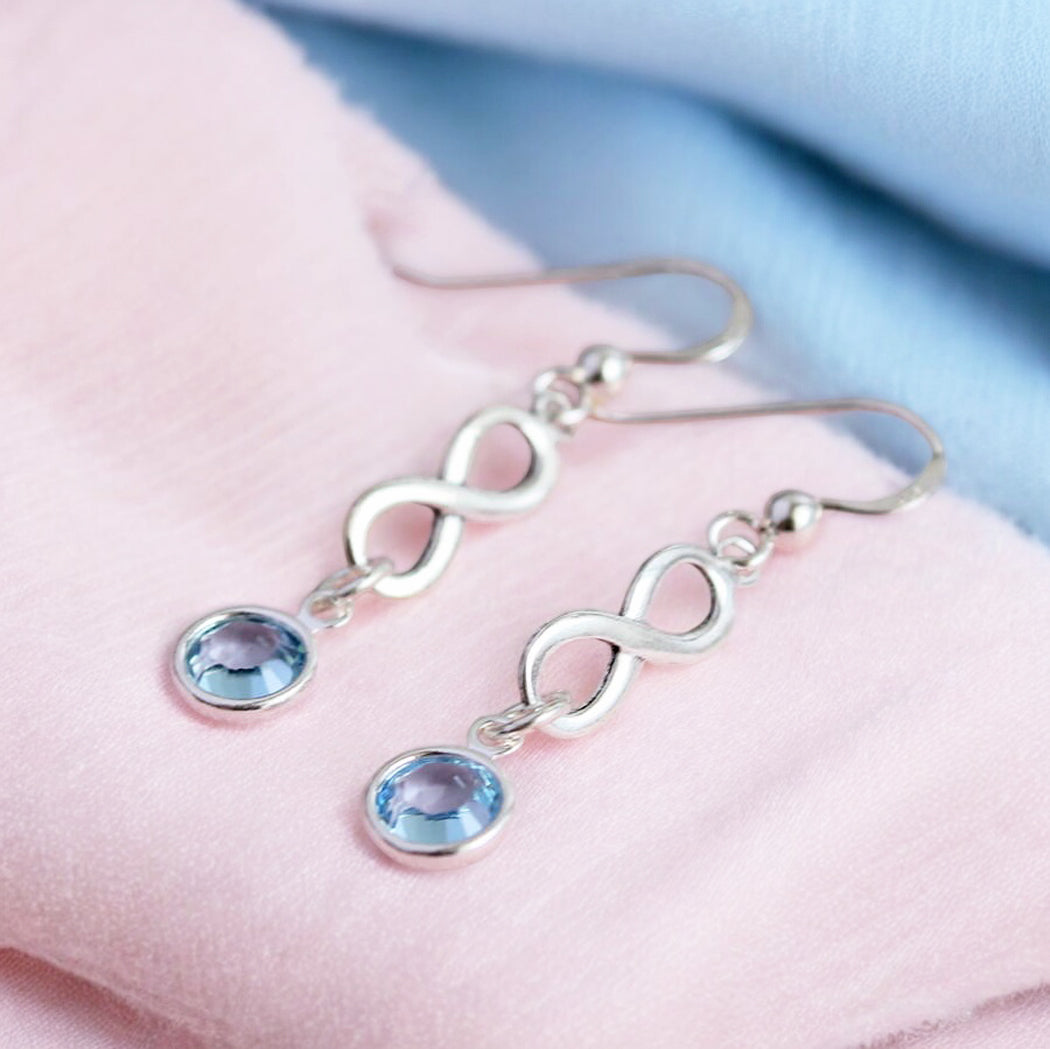 Joy by Corrine Smith Infinity Geburtsstein Ohrringe Silber