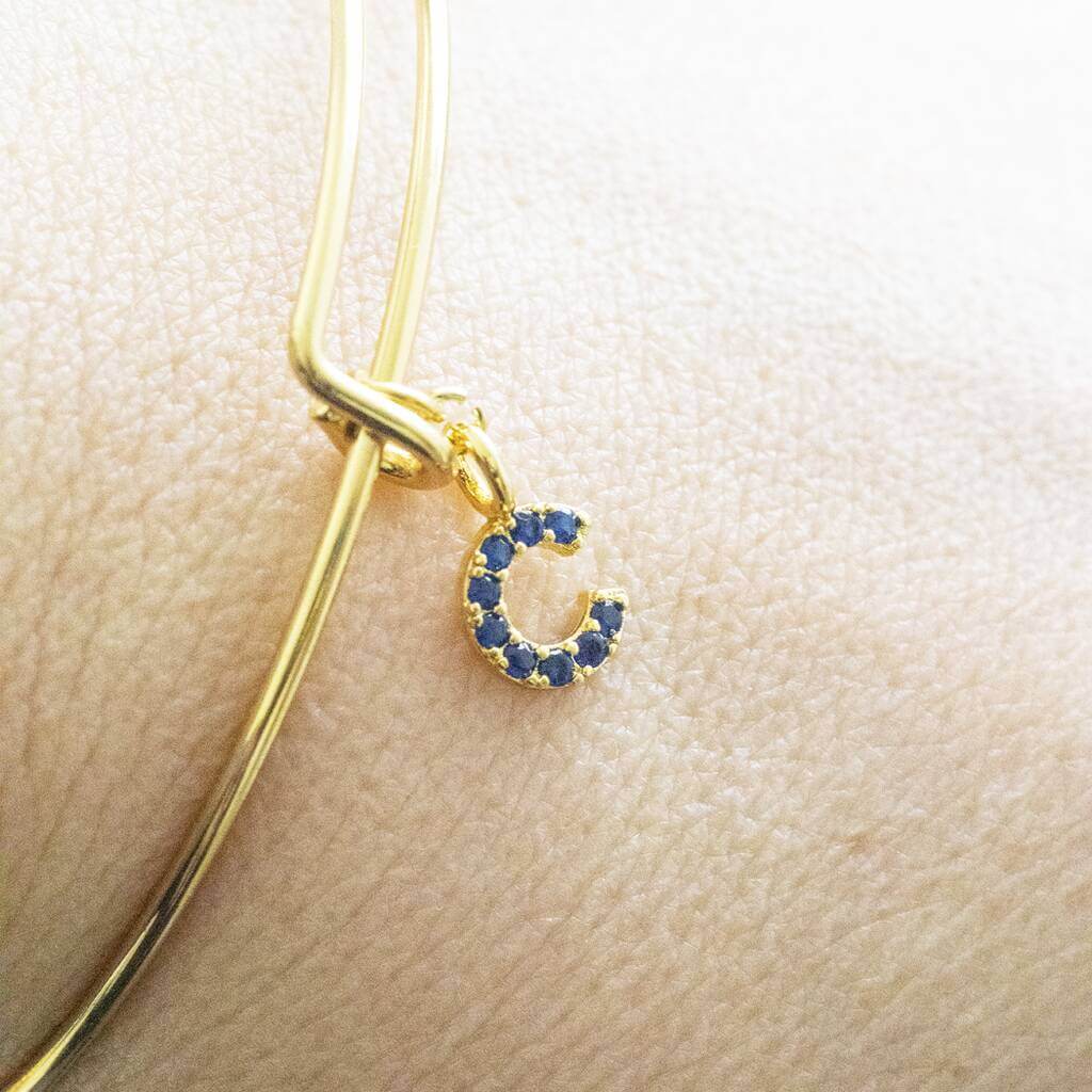 Joy by Corrine Smith Initial Armreif Geburtsstein Gold verstellbar
