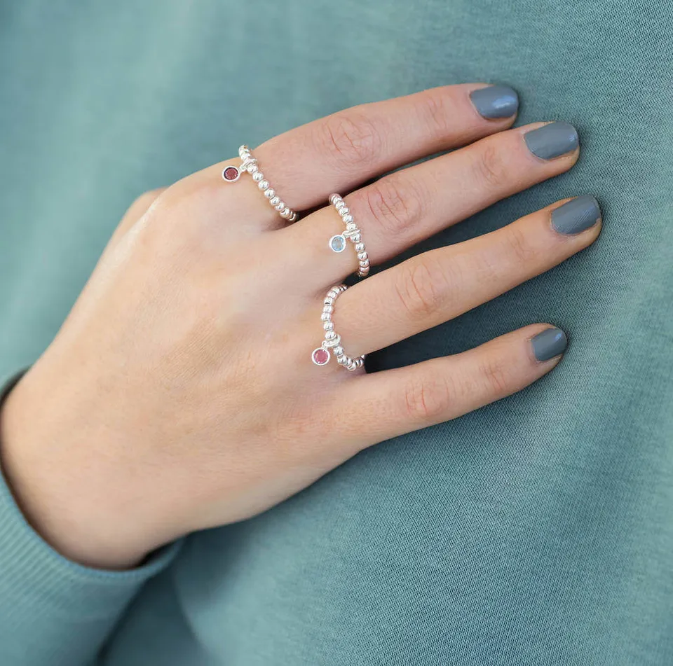 Joy by Corrine Smith Beaded Stretch Geburtsstein Ring Silber