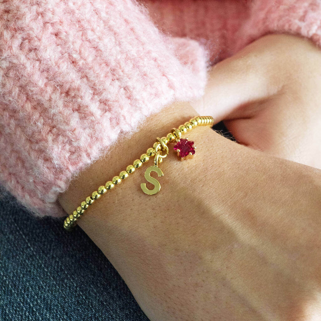 Joy by Corrine Smith Initial Birthstone Star Armband Gold