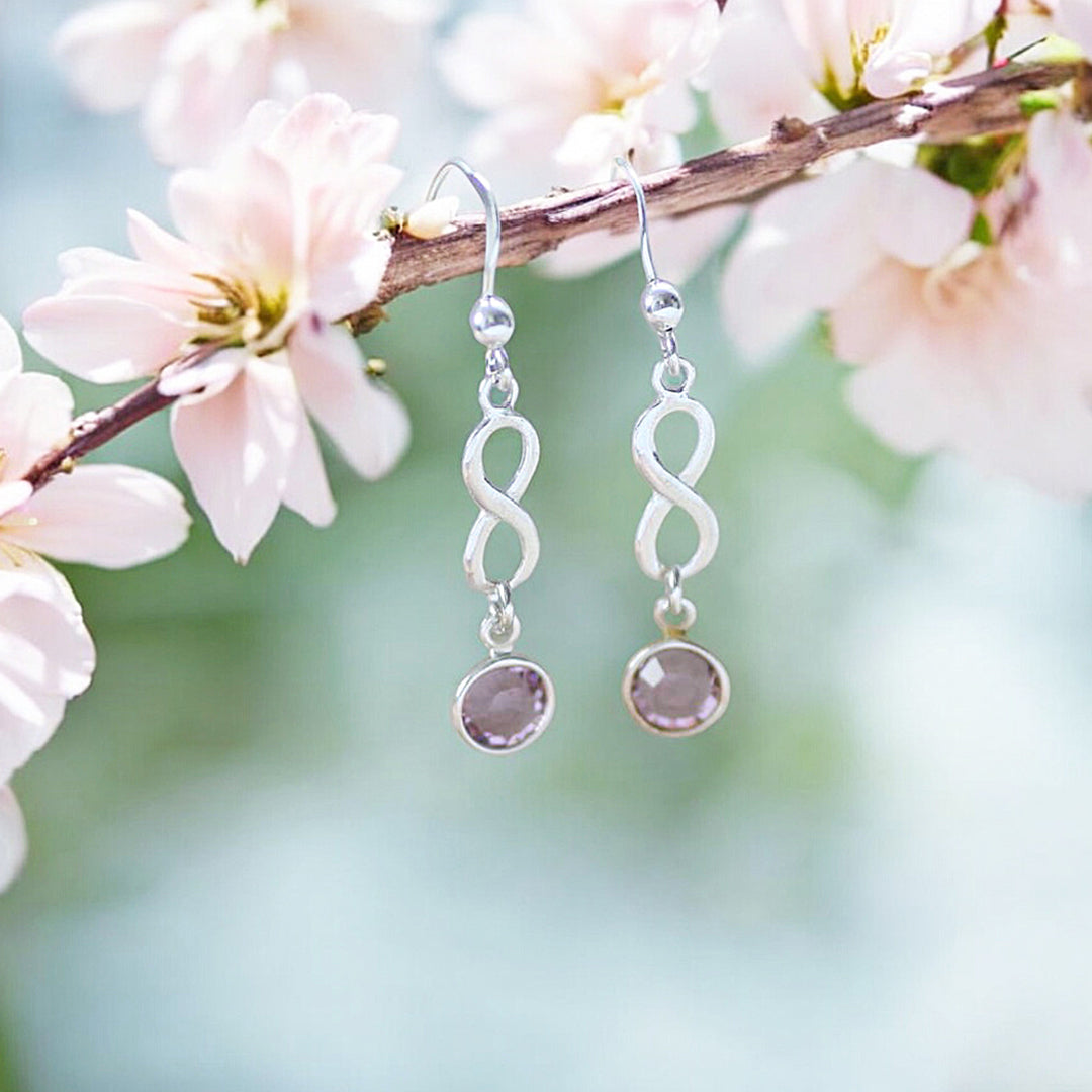 Joy by Corrine Smith Infinity Geburtsstein Ohrringe Silber Swarovski