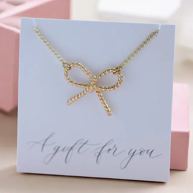 Joy by Corrine Smith Twisted Bow Halskette Gold Schleife