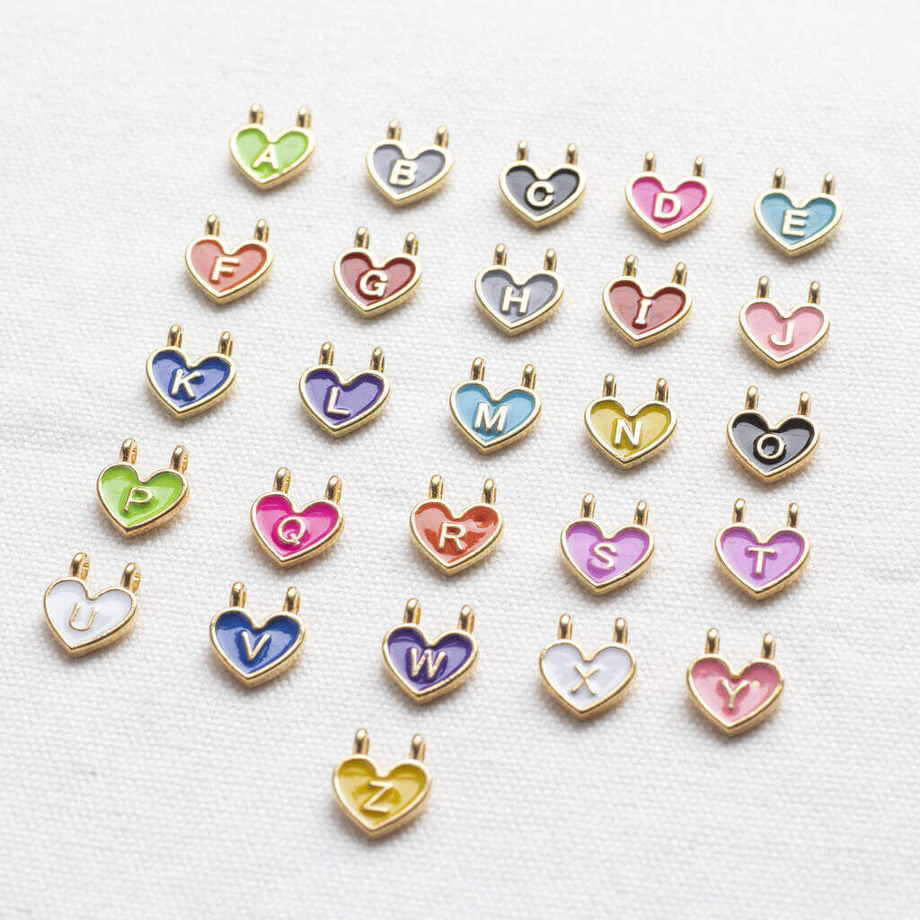 Joy by Corrine Smith Hearts Charm Armband vergoldet personalisiert