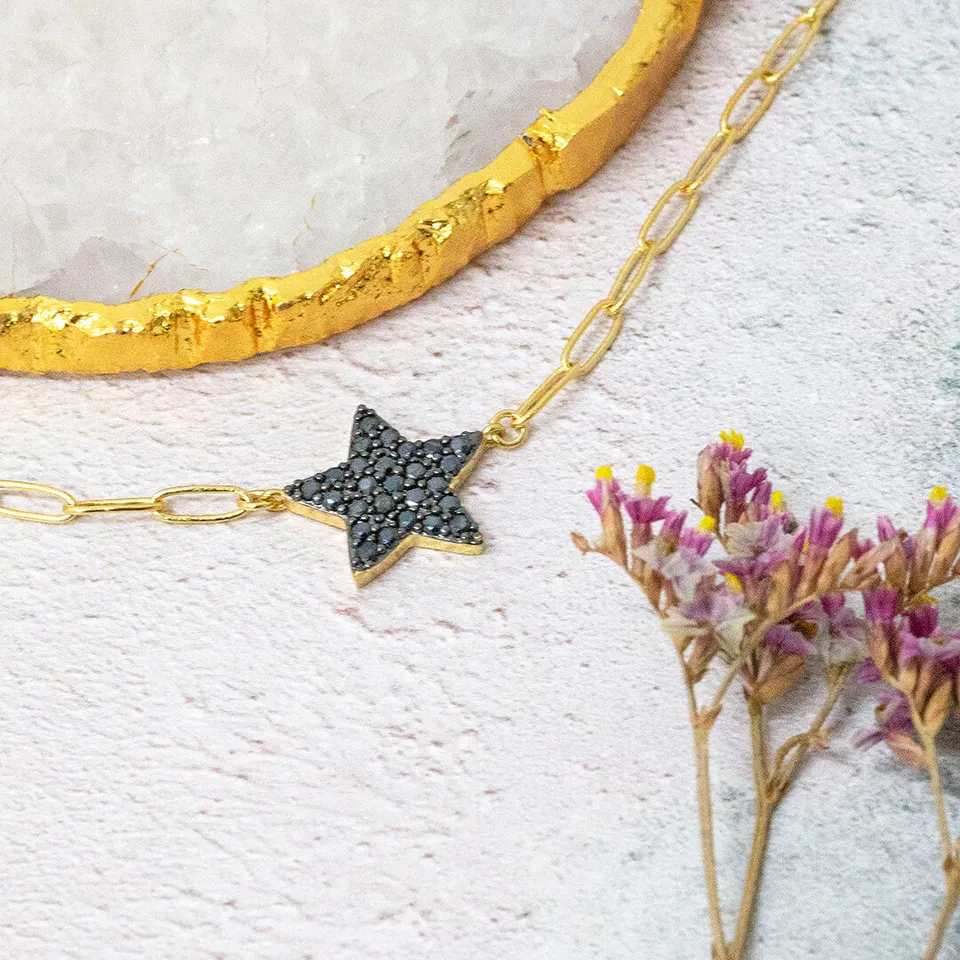 Joy by Corrine Smith Sirius Black Star Armband Gold schwarz