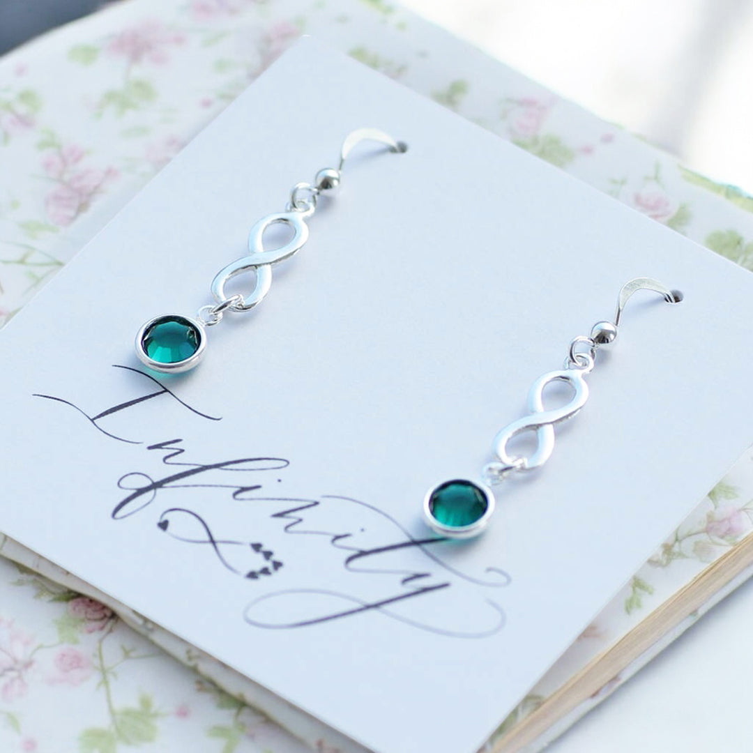 Joy by Corrine Smith Infinity Geburtsstein Ohrringe Silber Swarovski