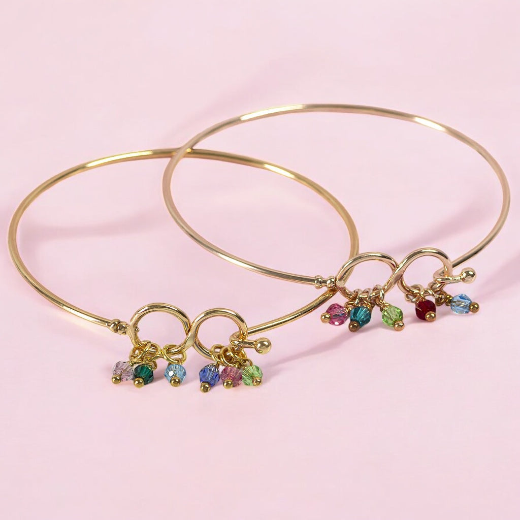 Joy by Corrine Smith Family Infinity Armreif mit Geburtsstein