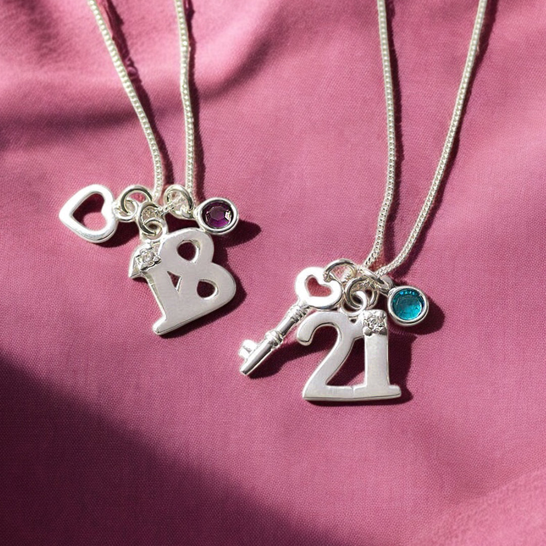 Joy by Corrine Smith Birthday Halskette Silber 18 21 Charm