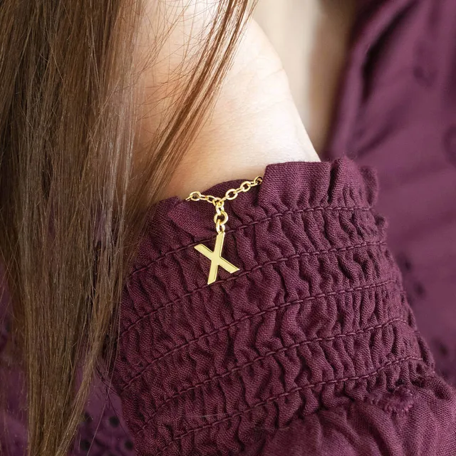 Joy by Corrine Smith Just a Kiss Armband vergoldet X-Anhänger