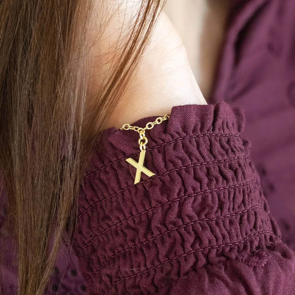 Joy by Corrine Smith Just a Kiss Armband vergoldet X-Anhänger