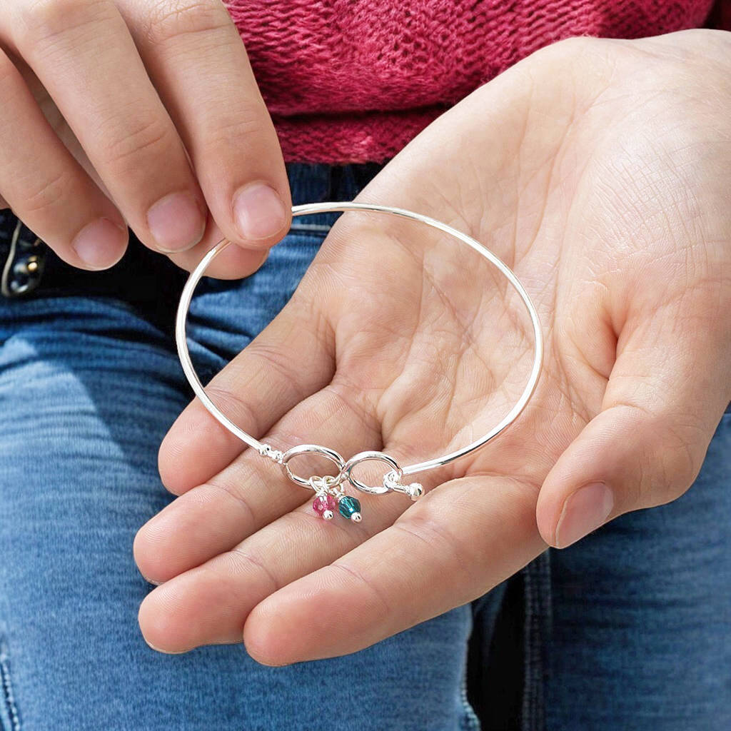 Joy by Corrine Smith Family Infinity Armreif mit Geburtsstein